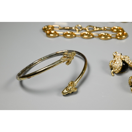 183 - A collection of vintage costume jewellery including gilt metal chains, paste set, necklaces and brac... 