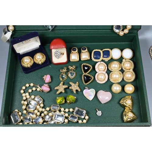 185 - A collection of costume jewellery including earrings by makers Givenchy, Liz Clairborne, Carolee, Ga... 