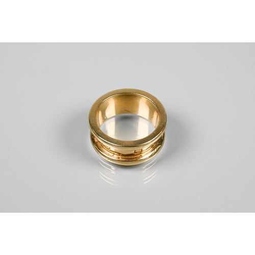 189 - A 9ct yellow gold gent's ring, of plain banded form, the hallmarks forming the design, size W 1/2, a... 