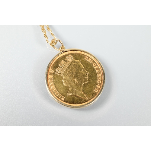 196 - A 1992 £2 gold coin in 9ct yellow gold mount, on modern chain, stamped 375, approx 25.6g all in