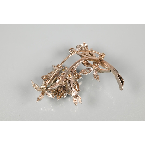 209 - A 19th century Continental diamond-set brooch en trembleuse, in three parts, in the form of an open ... 