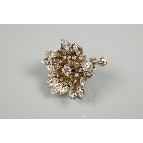 209 - A 19th century Continental diamond-set brooch en trembleuse, in three parts, in the form of an open ... 