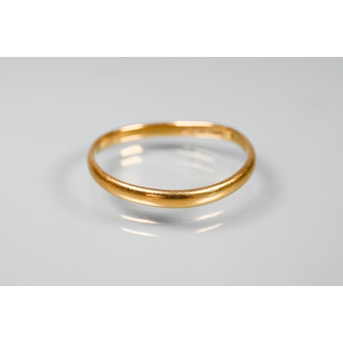 239 - A three-stone diamond ring in crossover setting, 18 ct yellow gold, size R 1/2, to/w an old narrow 2... 