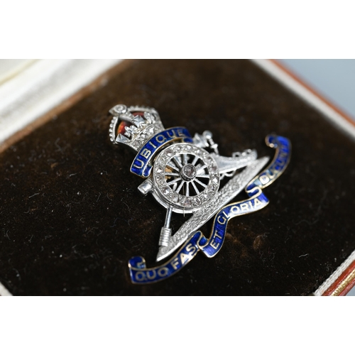 246 - A diamond set Royal Artillery regimental brooch, enamel and white and yellow metal set, 6.7g, in fit... 