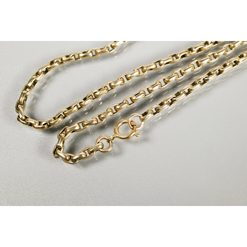 249 - A long yellow metal guard chain, 60 cm, unmarked, 21.2g