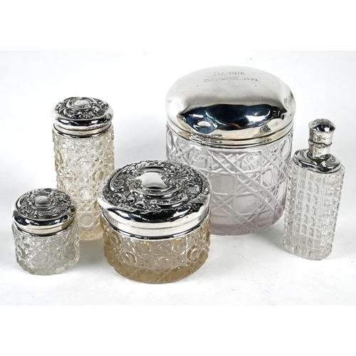 26 - A Continental hobnail-cut glass scent flask and stopper with silver top, to/w three cut glass toilet... 