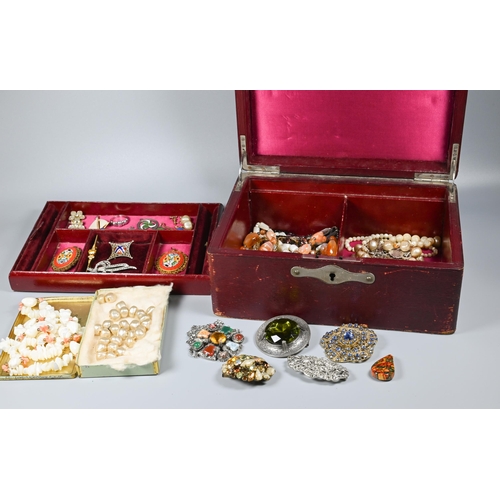 263 - A burgundy leather jewel box with assortment of jewellery items within including bead necklaces, mic... 