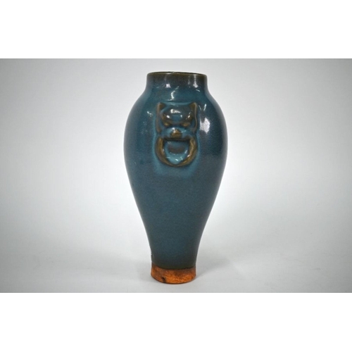 293 - A Chinese Song style Junyao vase with taotie mask ring handles, covered with a crackled opaque blue-... 