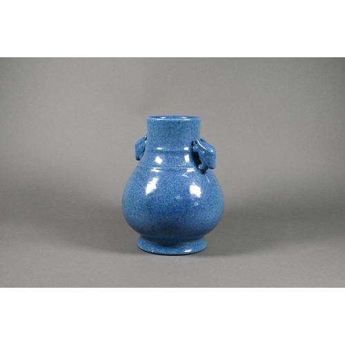 300 - A Chinese archaistic hu-form vase with moulded qilin mask handles in the 18th century (Qing dynasty)... 