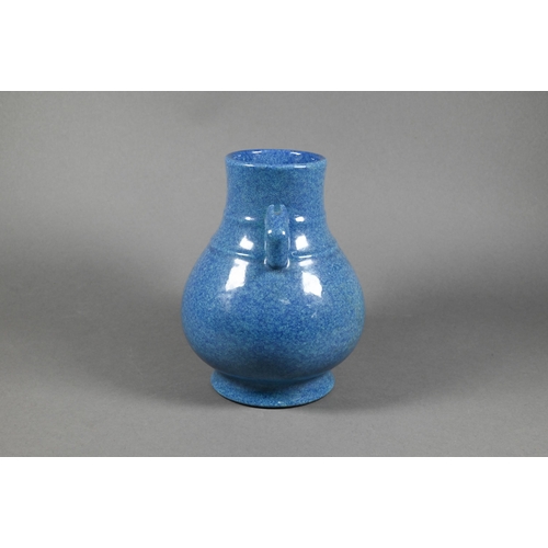 300 - A Chinese archaistic hu-form vase with moulded qilin mask handles in the 18th century (Qing dynasty)... 