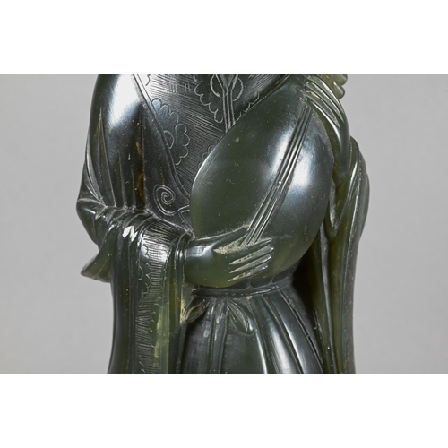 301 - A 20th century Chinese carved green soapstone figure of a courtesan wearing traditional robes with f... 