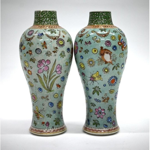 305 - A pair of 18th century Chinese baluster vases, painted with natural history designs featuring butter... 