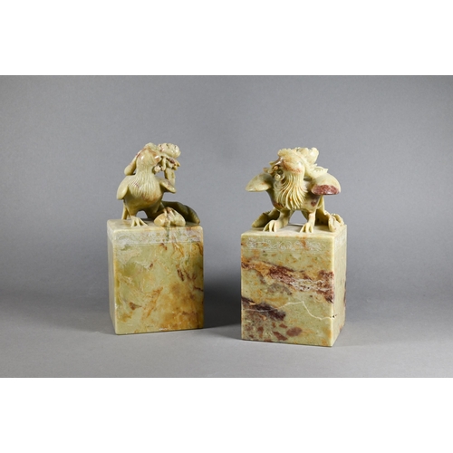 307 - A pair of early 20th century Chinese carved soapstone bookends, over-sized chop seal square form sur... 