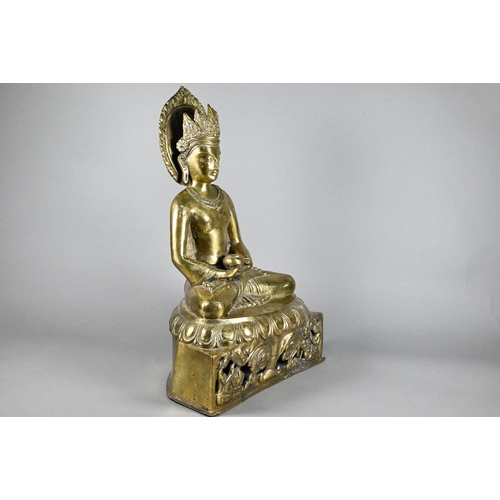 308 - A 20th century Thai polished bronze Amitabha Buddha holding an alms bowl, hands in dyana-mudra sitti... 