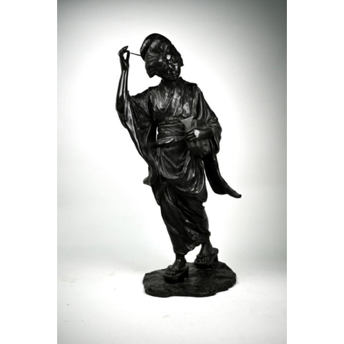 309 - A large late 19th century Japanese bronze okimono of a Geisha by Genryusai Seiya, cast wearing a kim... 