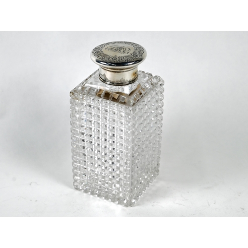 31 - A Victorian hobnail-cut square cologne bottle with silver bun cover, London 1854, 15 cm high
