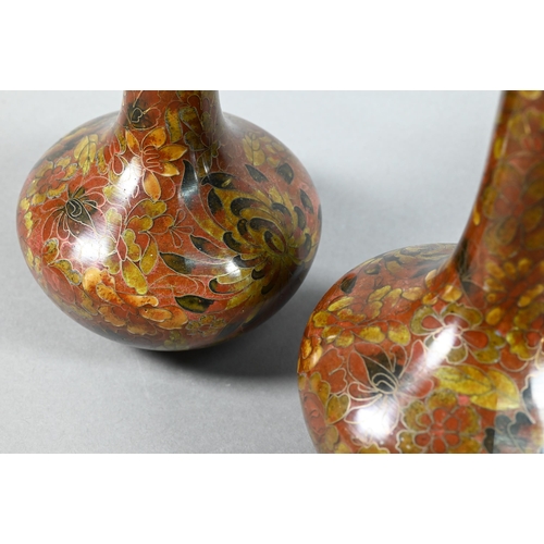 318 - A pair of 20th century Japanese cloisonne bottle vases decorated with floral designs in autumnal pal... 