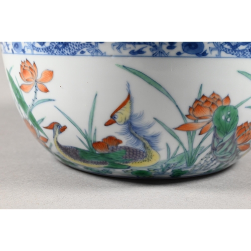 320 - A Chinese 18th century doucai 'duck and lotus' marriage bowl, finely painted in polychrome enamels w... 