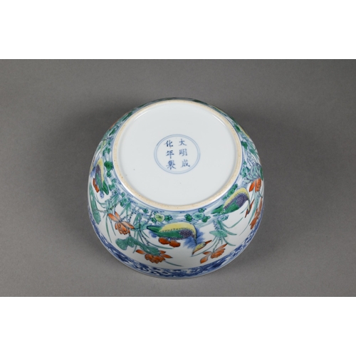 320 - A Chinese 18th century doucai 'duck and lotus' marriage bowl, finely painted in polychrome enamels w... 