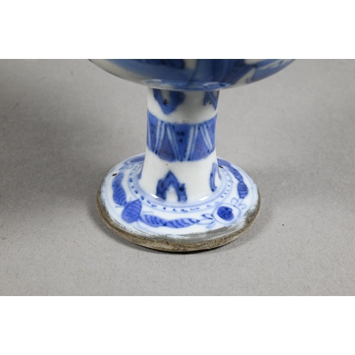 322 - A mid 17th century Chinese blue and white porcelain stem cup, late Ming or transitional period, prob... 