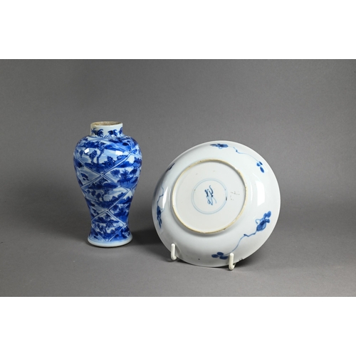 324 - Two 18th century Chinese blue and white tea bowls painted in underglaze blue with floral and foliate... 