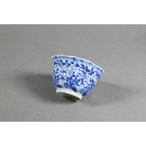 324 - Two 18th century Chinese blue and white tea bowls painted in underglaze blue with floral and foliate... 