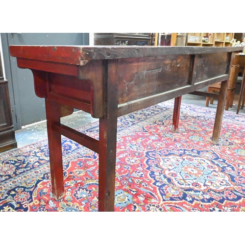 330 - An antique Chinese red lacquer four drawer side table / altar table, raised on square section legs, ... 