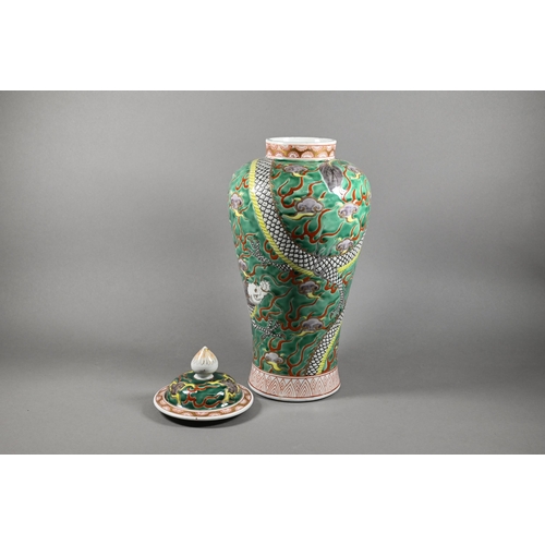 332 - A mid 20th century Chinese famille verte baluster vase with domed cover surmounted by lotus bud fini... 