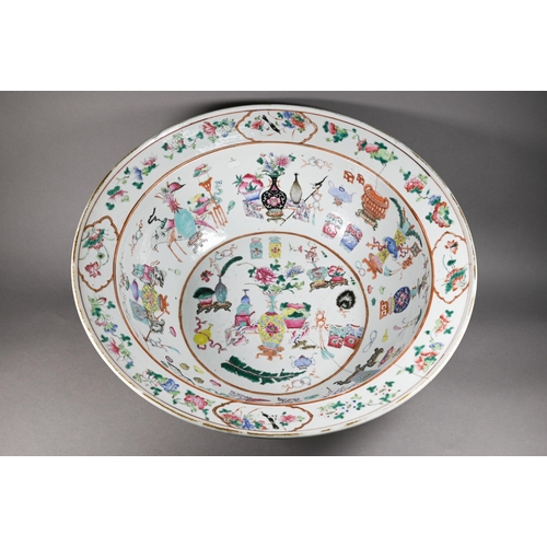 333 - A large 19th century famille rose bowl painted in polychrome enamels with 'one hundred antiques' des... 