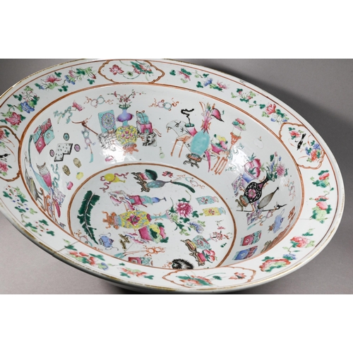 333 - A large 19th century famille rose bowl painted in polychrome enamels with 'one hundred antiques' des... 