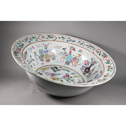 333 - A large 19th century famille rose bowl painted in polychrome enamels with 'one hundred antiques' des... 