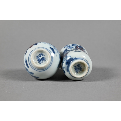 336 - Four Chinese underglaze blue and copper red snuff bottles painted with figural narrative scenes, lar... 