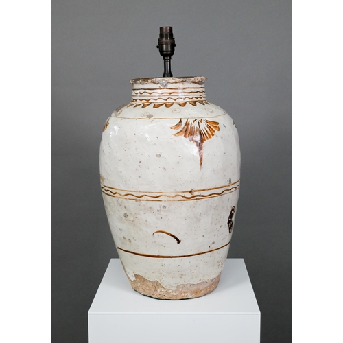 337 - A large Chinese Cizhou stoneware storage jar, probably Ming dynasty, covered with an ivory slip glaz... 