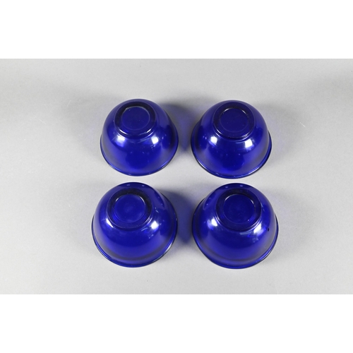 338 - Four Chinese Peking blue glass bowls with slightly everted rim, deep rounded sides and circular foot... 