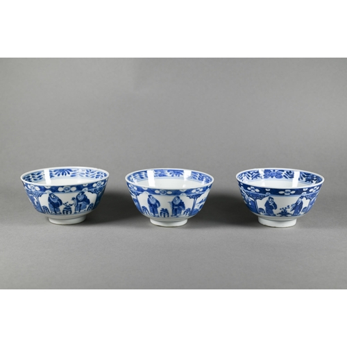 352 - Three 19th century Chinese blue and white bowls painted in underglaze blue with alternating panels o... 