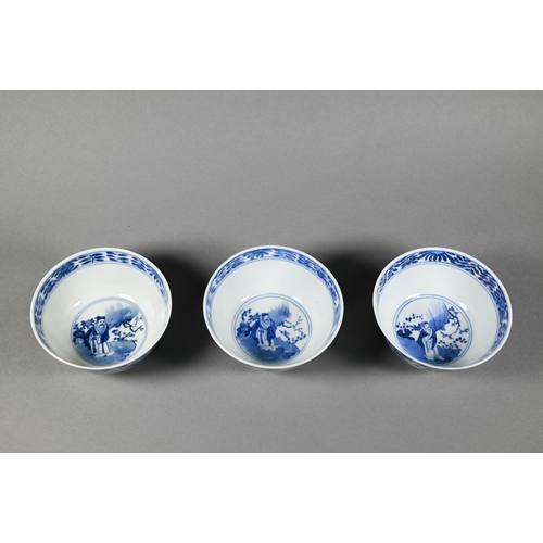 352 - Three 19th century Chinese blue and white bowls painted in underglaze blue with alternating panels o... 