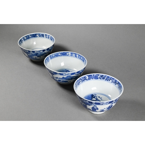 352 - Three 19th century Chinese blue and white bowls painted in underglaze blue with alternating panels o... 