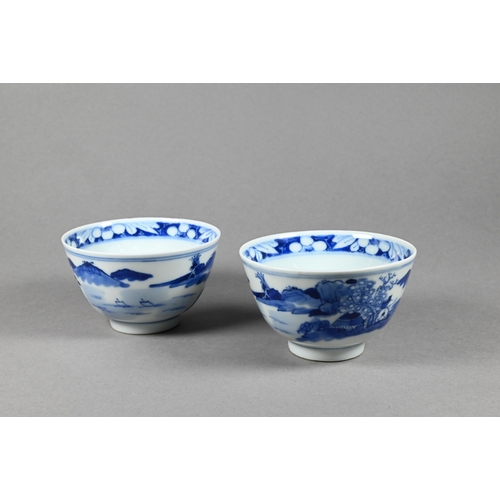 353 - A pair of 19th century Chinese blue and white tea bowls painted in underglaze blue with a figure lea... 