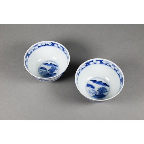 353 - A pair of 19th century Chinese blue and white tea bowls painted in underglaze blue with a figure lea... 