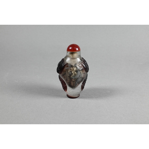 356 - A Chinese Peking cameo glass ovoid snuff bottle with red stopper, the clear glass bottle inside pain... 