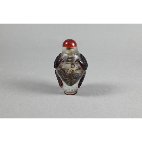 356 - A Chinese Peking cameo glass ovoid snuff bottle with red stopper, the clear glass bottle inside pain... 