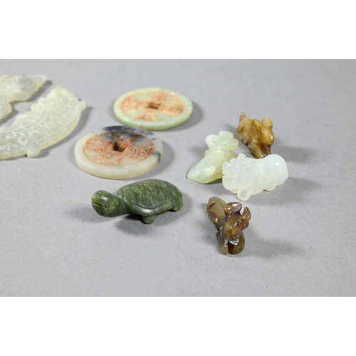 361 - A small collection of Chinese jade and other green hardstone carvings including two cash type coins ... 