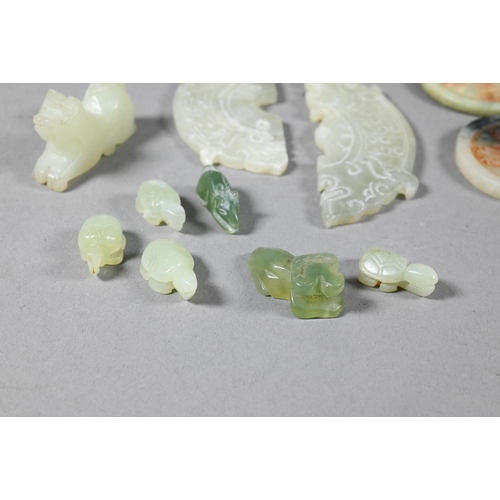 361 - A small collection of Chinese jade and other green hardstone carvings including two cash type coins ... 