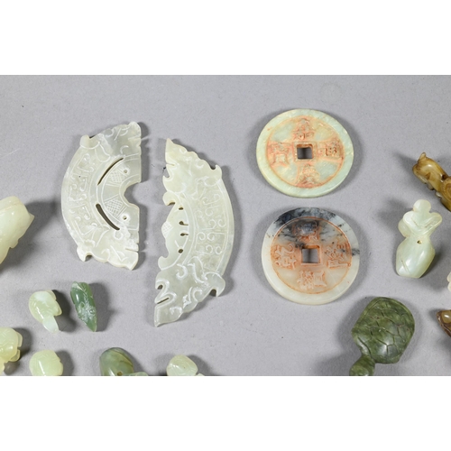 361 - A small collection of Chinese jade and other green hardstone carvings including two cash type coins ... 