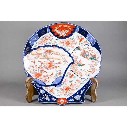 374 - A 19th century Japanese Imari scallop shell plate painted in the typical palette with Japanese phoen... 