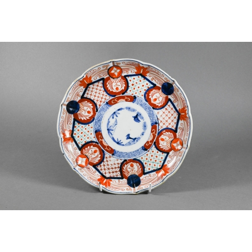 374 - A 19th century Japanese Imari scallop shell plate painted in the typical palette with Japanese phoen... 