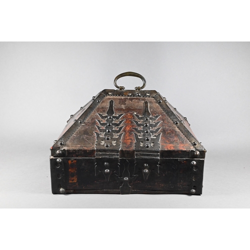 376 - An Indian Kerala Netturpetti jewellery casket of typical form, hardwood metal mounted body with vest... 