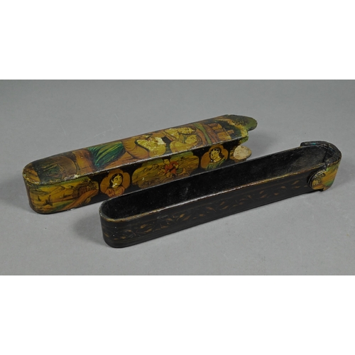 380 - A 19th century Indian/Persian papier mache lacquered qalamdan (pen box) with sliding implement tray,... 