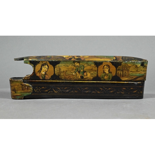 380 - A 19th century Indian/Persian papier mache lacquered qalamdan (pen box) with sliding implement tray,... 