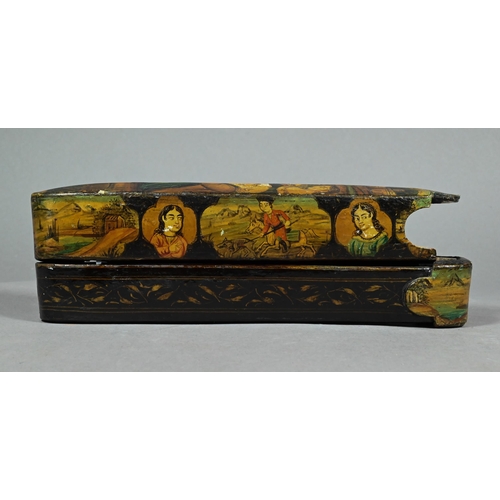 380 - A 19th century Indian/Persian papier mache lacquered qalamdan (pen box) with sliding implement tray,... 